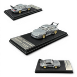 Lot57Supplies Diecast Shop MC RWB993 G2 Single Deck Wing diecast model car in cement grey with gold wheels, 1:64 scale.