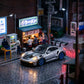 Lot57Supplies Diecast Shop 1:64 metallic silver Porsche 992 GT3 RS resin model with blue wheels and black accents.