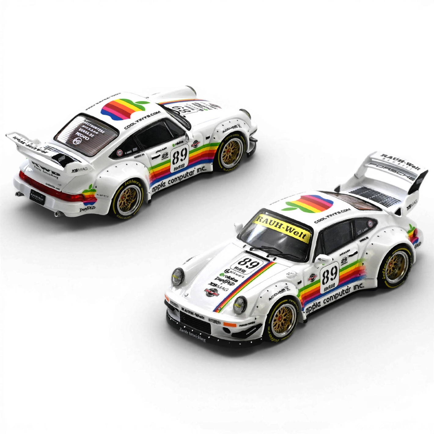 Lot57Supplies Diecast Shop: White 1:64 scale INNO64 RWB 930 diecast model car with Apple Computer livery and rainbow stripe.