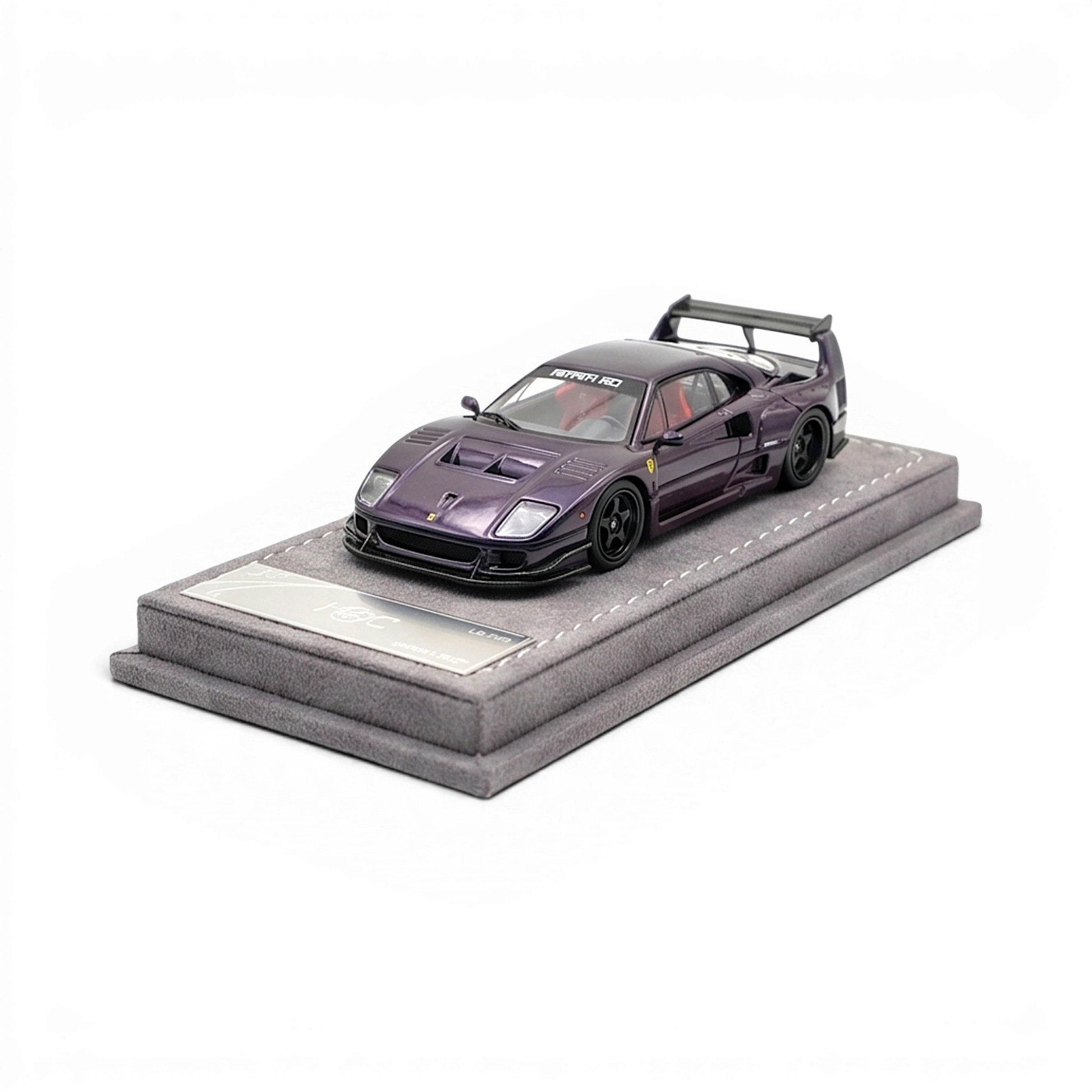 Lot57Supplies Diecast Shop 1:64 scale AOC F40 diecast model with chameleon paint and black accents on a grey display base.