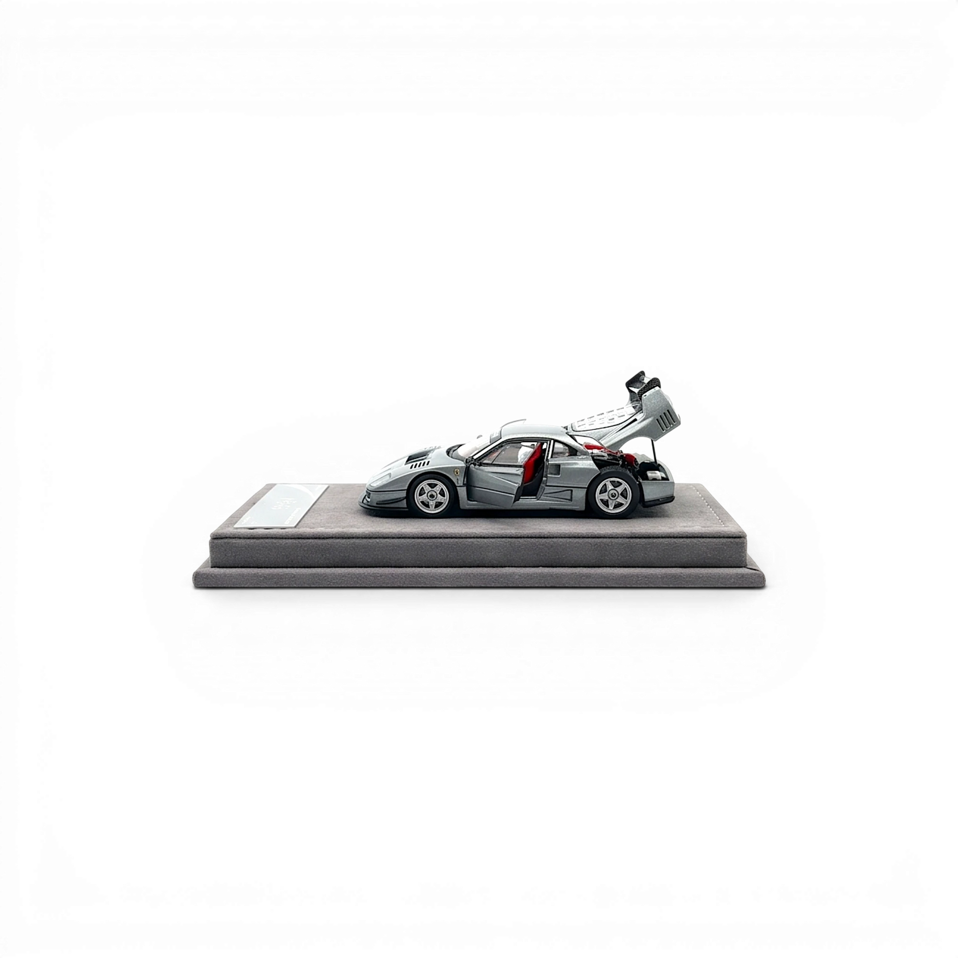 Lot57Supplies Diecast Shop 1:64 scale silver gray diecast model of AOC F40 with open doors and engine cover.
