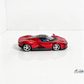 Lot57Supplies Diecast Shop Artisan Models 1:64 scale diecast Ferrari SP3 in metallic red, side profile view.