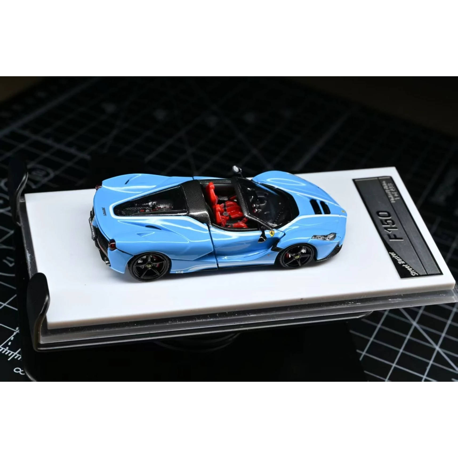Lot57Supplies Diecast Shop Street Buster baby blue F150 Aperta roadster diecast model car with red interior in 1:64 scale