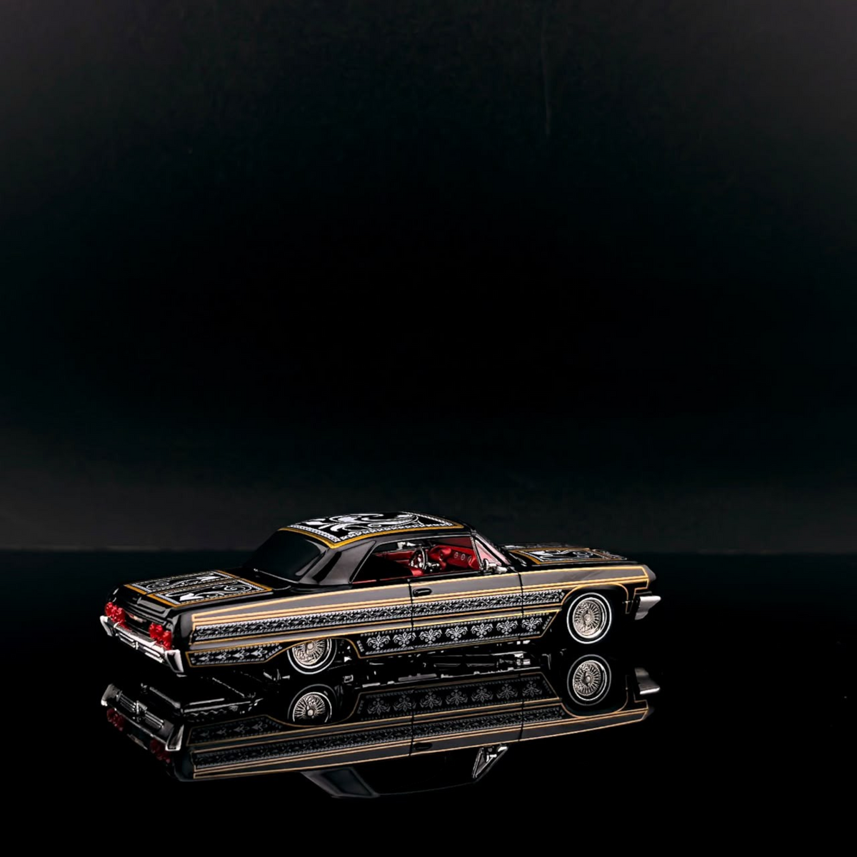 Lot57Supplies Diecast Shop 1:64 scale Fine Works64 black and gold Impala lowrider diecast car with intricate detailing