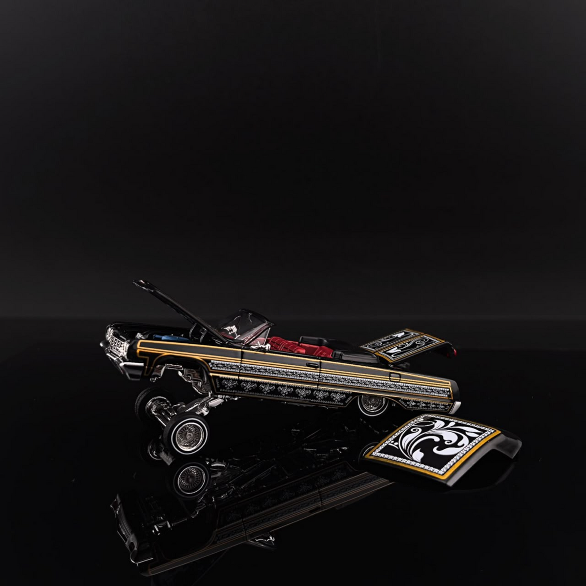Lot57Supplies Diecast Shop Fine Works64 black and gold Impala lowrider diecast model with intricate detailing