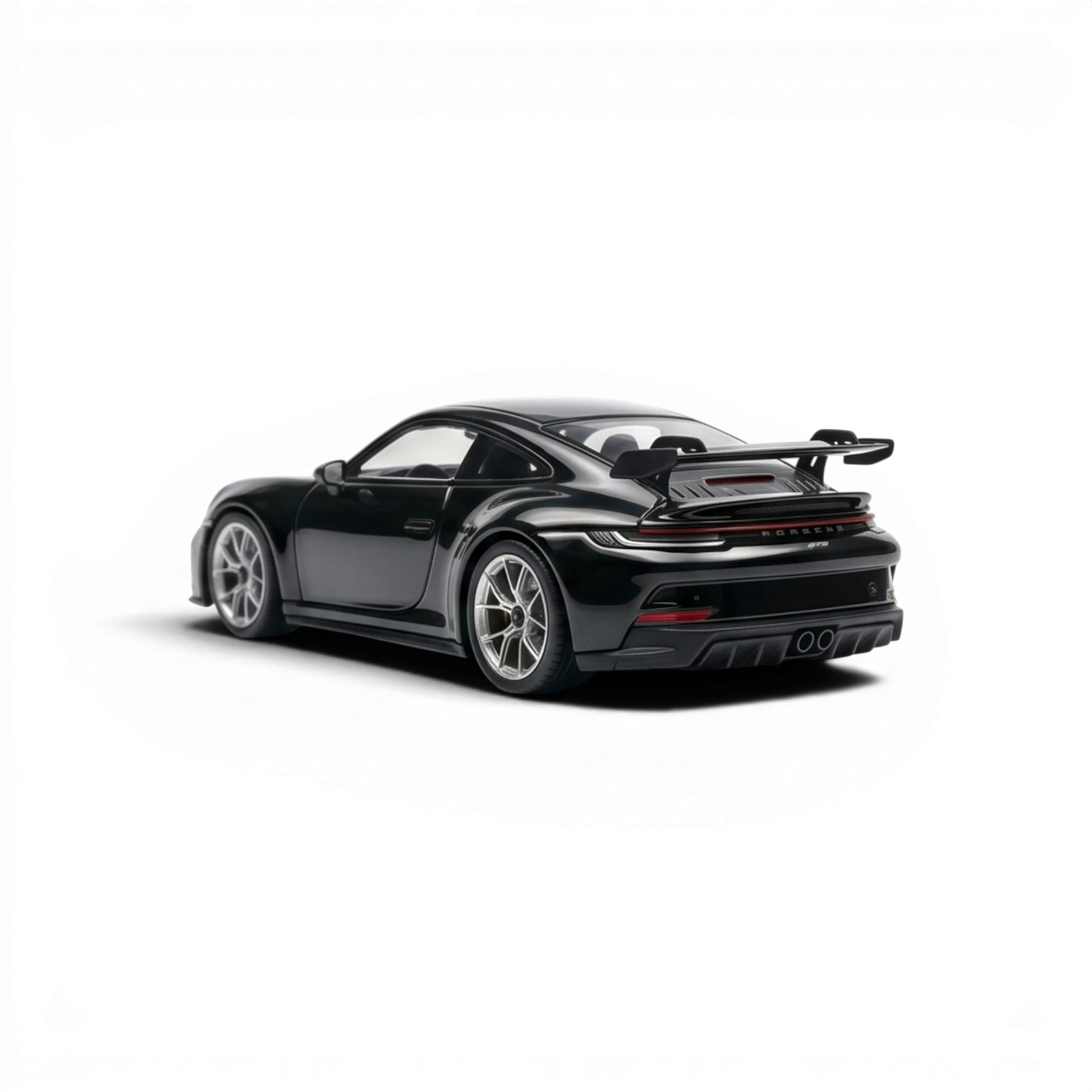 Lot57Supplies Diecast Shop black 1:64 scale resin Porsche 911 GT3 model with large rear spoiler and silver wheels.