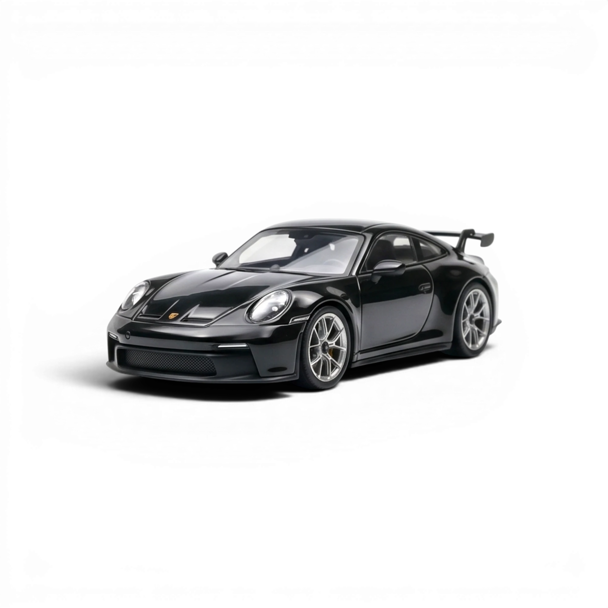 Lot57Supplies Diecast Shop black 1:64 scale resin Porsche 911 GT3 model with detailed wheels and spoiler.