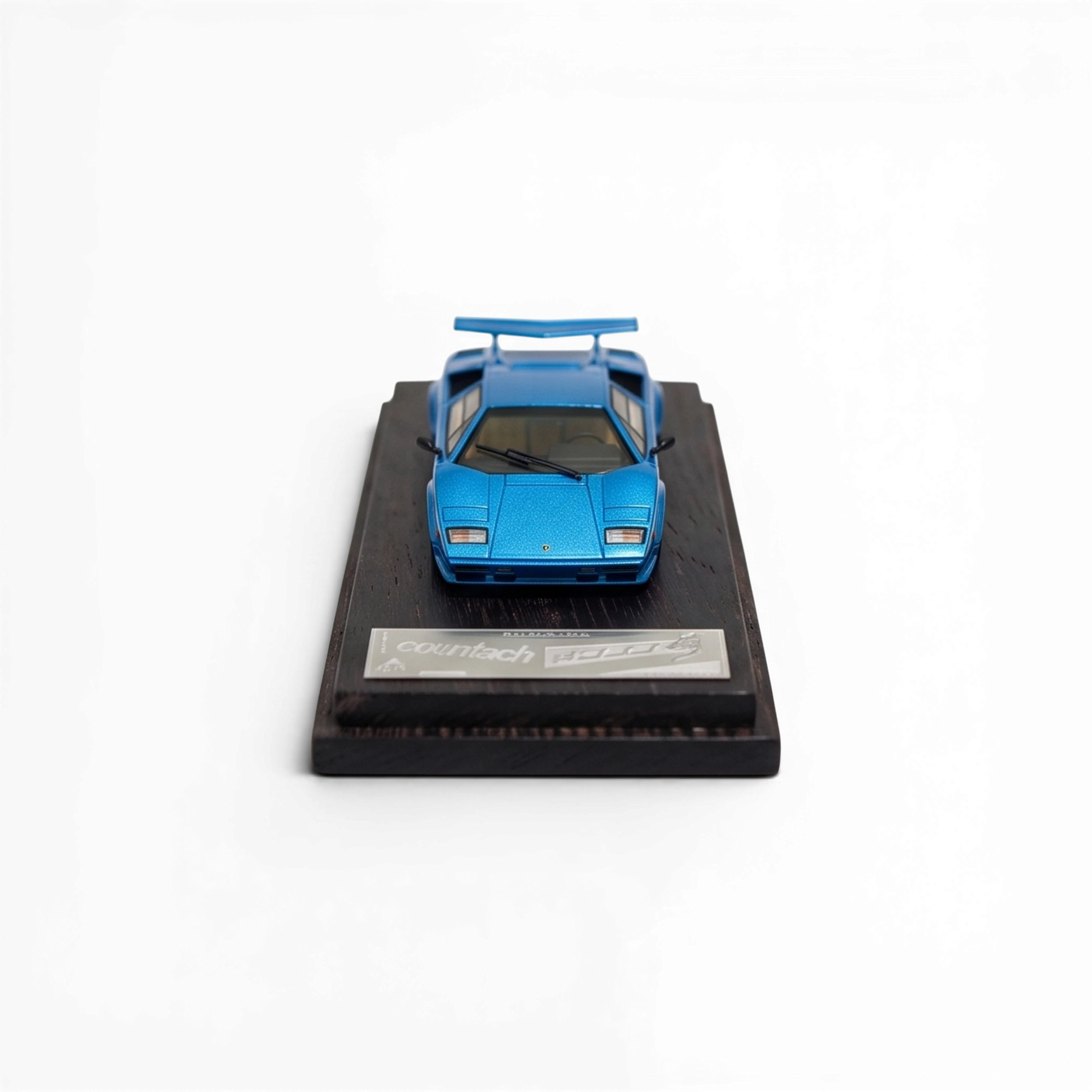 Lot57Supplies Diecast Shop DeepMaker 1:64 scale blue Countach 5000S resin model car on a wooden display base