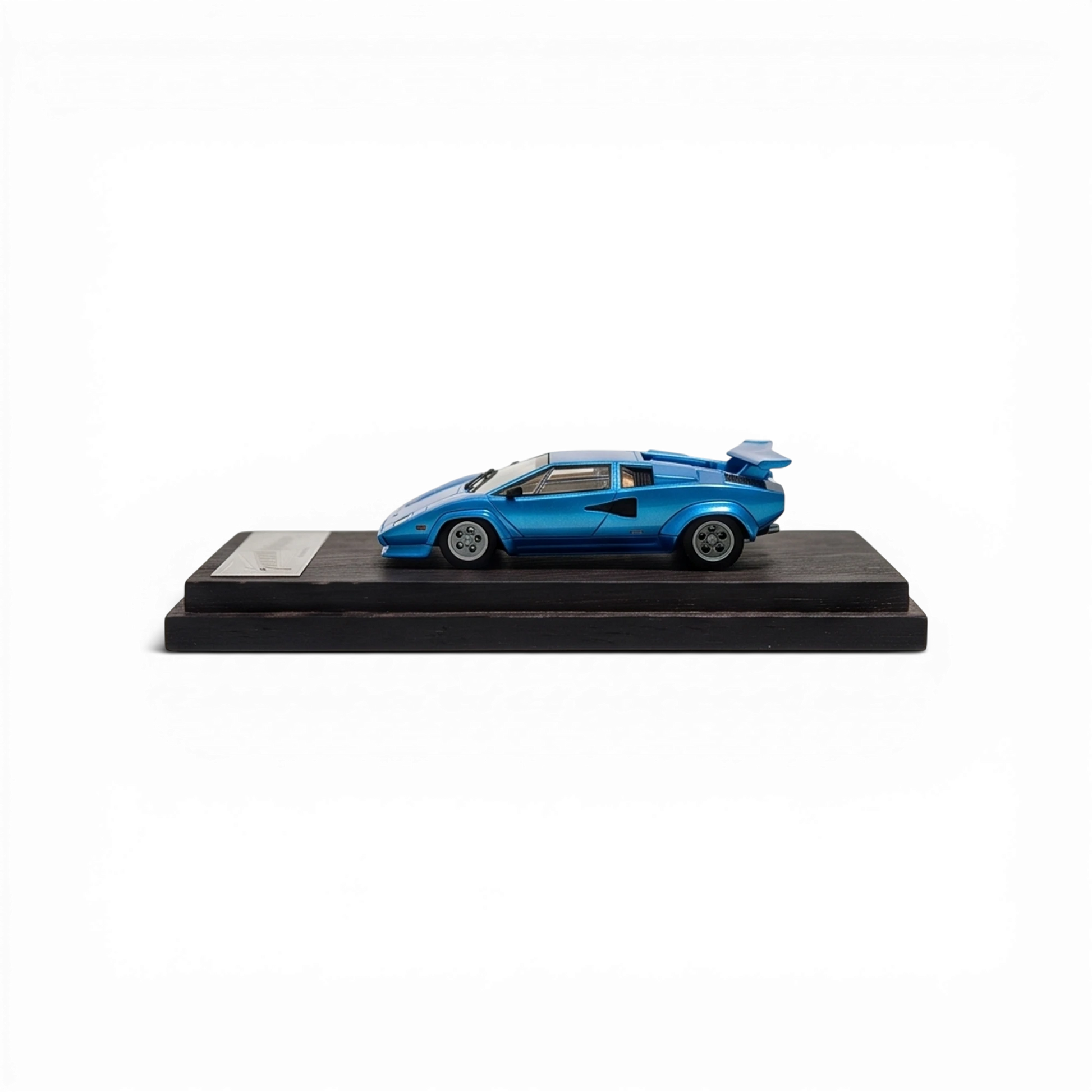 Lot57Supplies Diecast Shop DeepMaker Countach 5000S 1:64 scale resin model car in blue on a wooden display base.