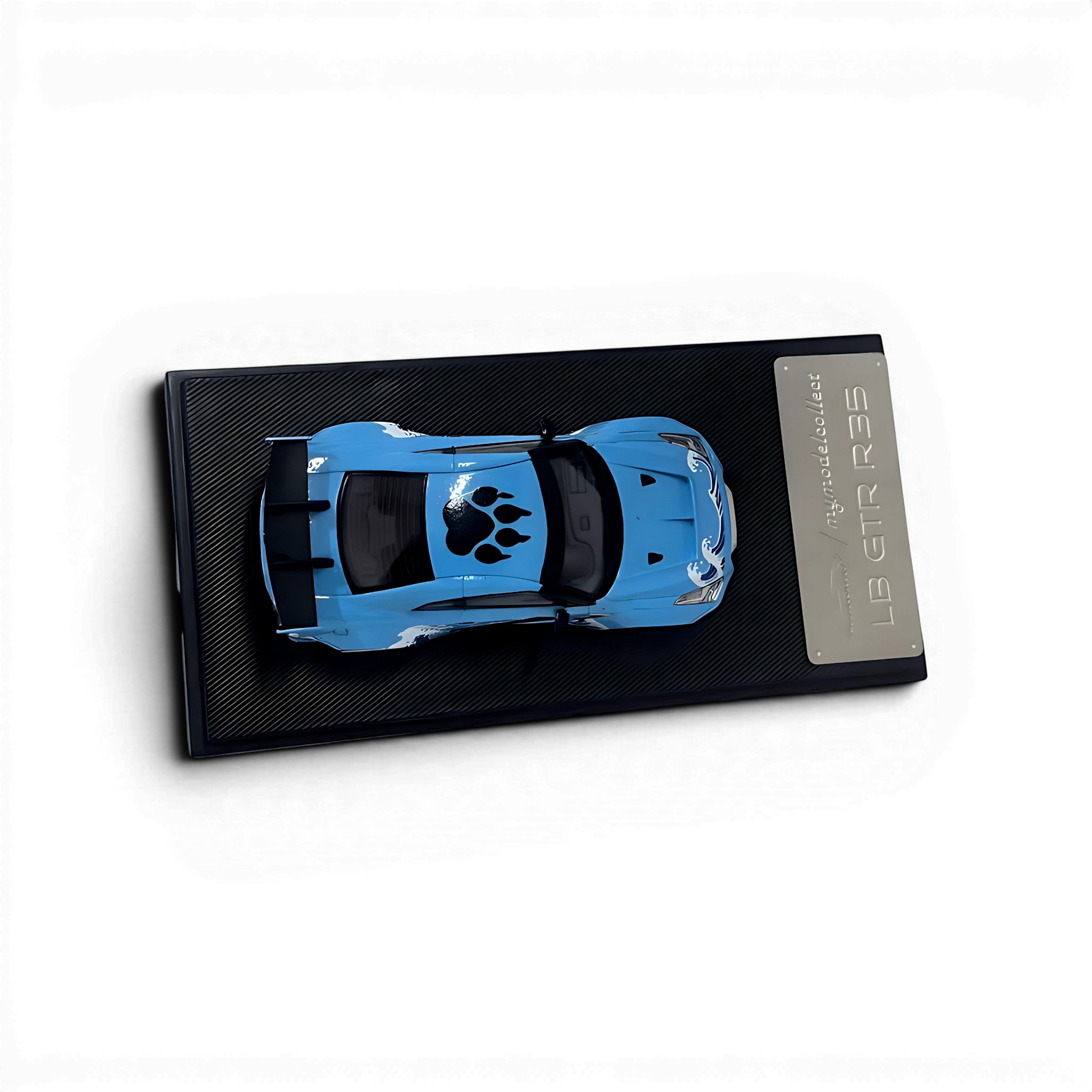 Lot57Supplies Diecast Shop 1:64 scale MC LB GTR 1.5v diecast model car in blue with Godzilla livery and display base