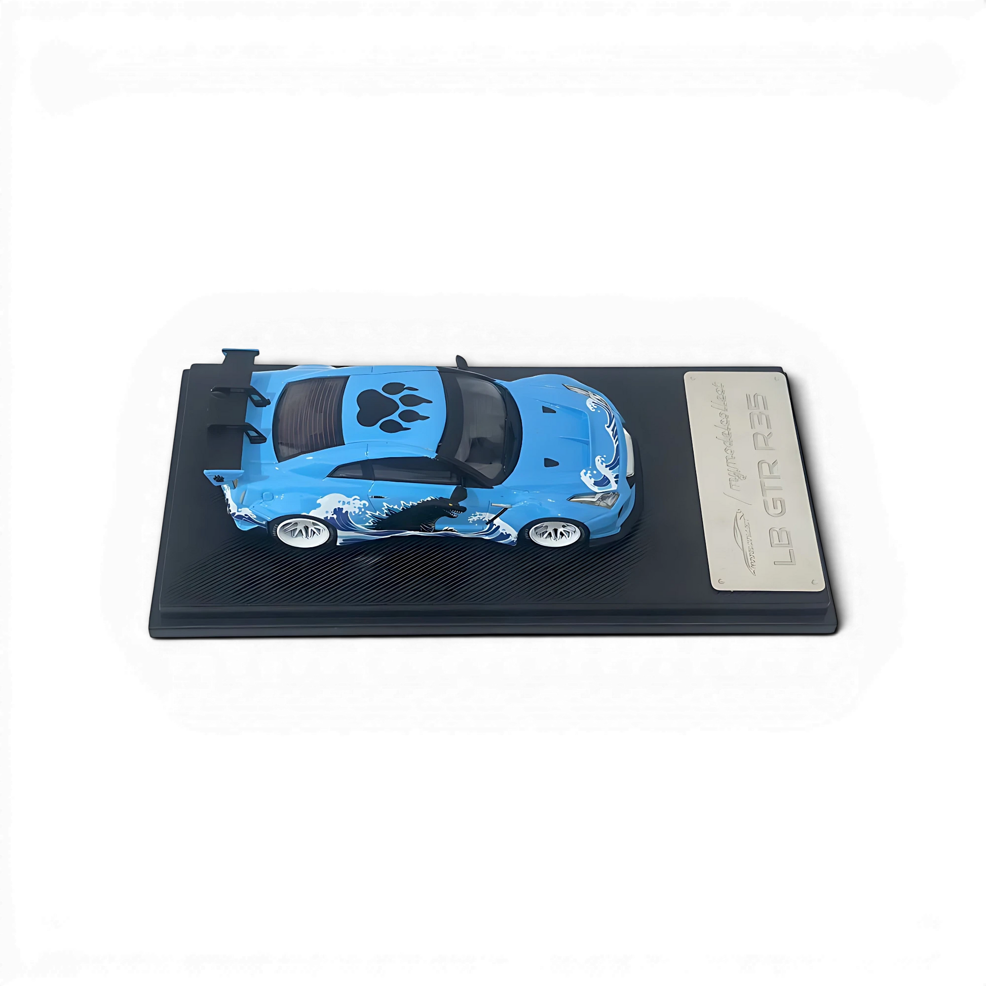 Lot57Supplies Diecast Shop 1:64 scale MC LB GTR R35 diecast model car in blue with Godzilla wave livery on display base