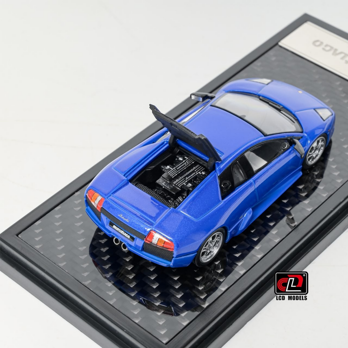 Lot57Supplies Diecast Shop 1:64 scale blue LCD Lamborghini Murciélago diecast model car with open engine bay