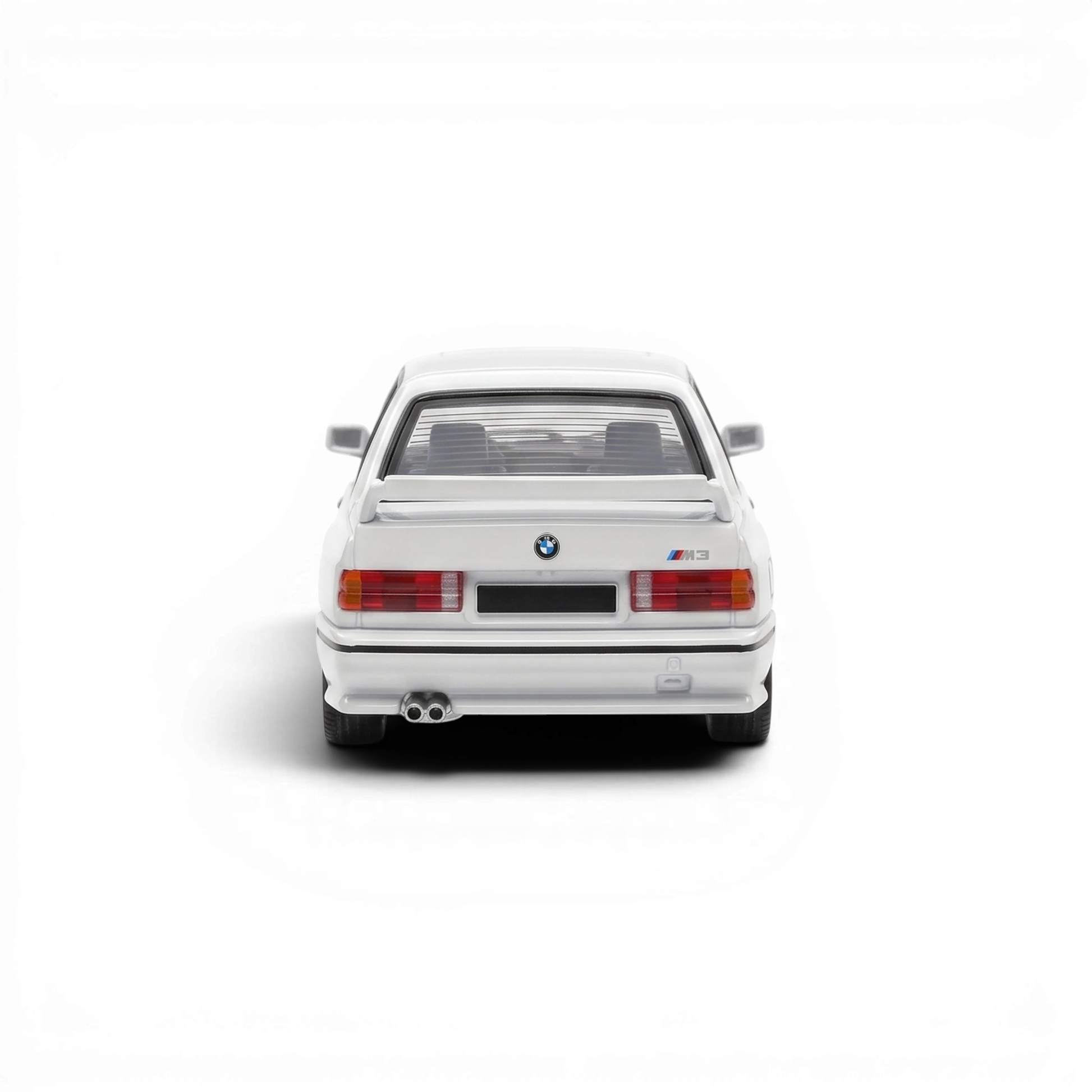 Rear view of a pearl white Mortal BMW E30 M3 diecast model car from Lot57Supplies Diecast Shop