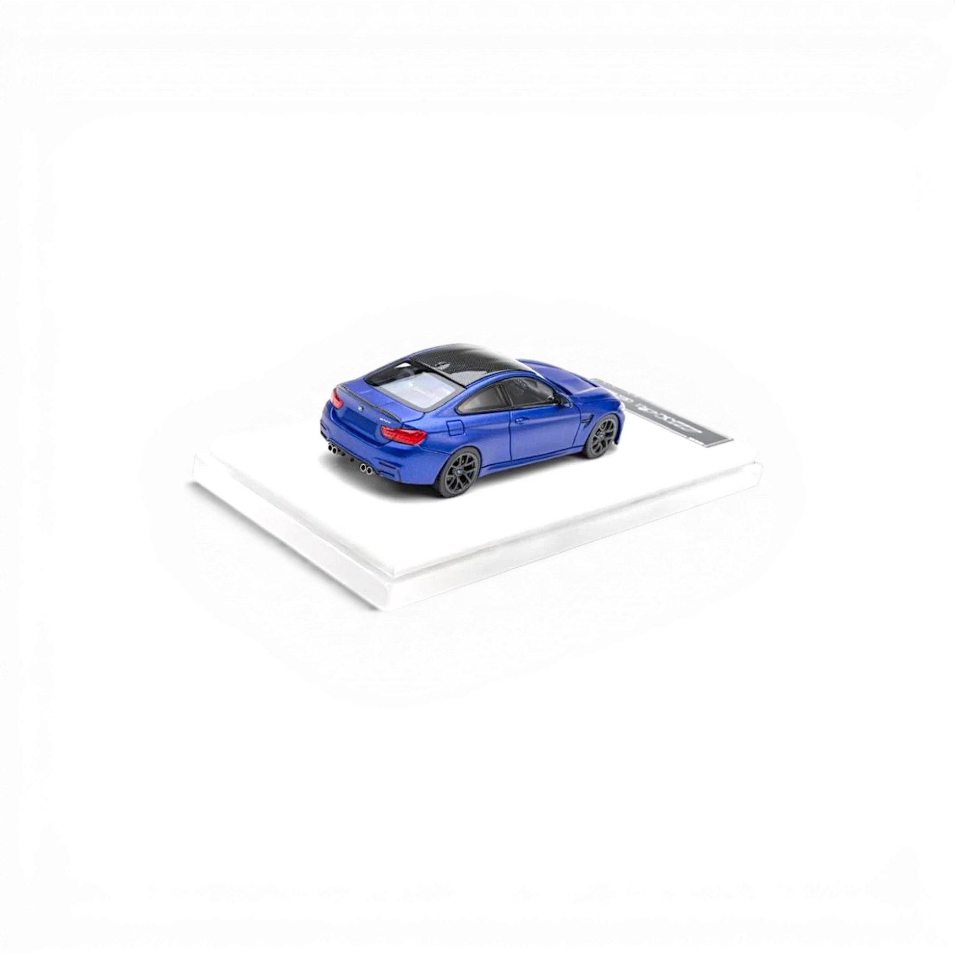 Lot57Supplies Diecast Shop HH Model BMW F82 M4 CS 1:64 scale diecast model in frozen dark blue with black roof and wheels.
