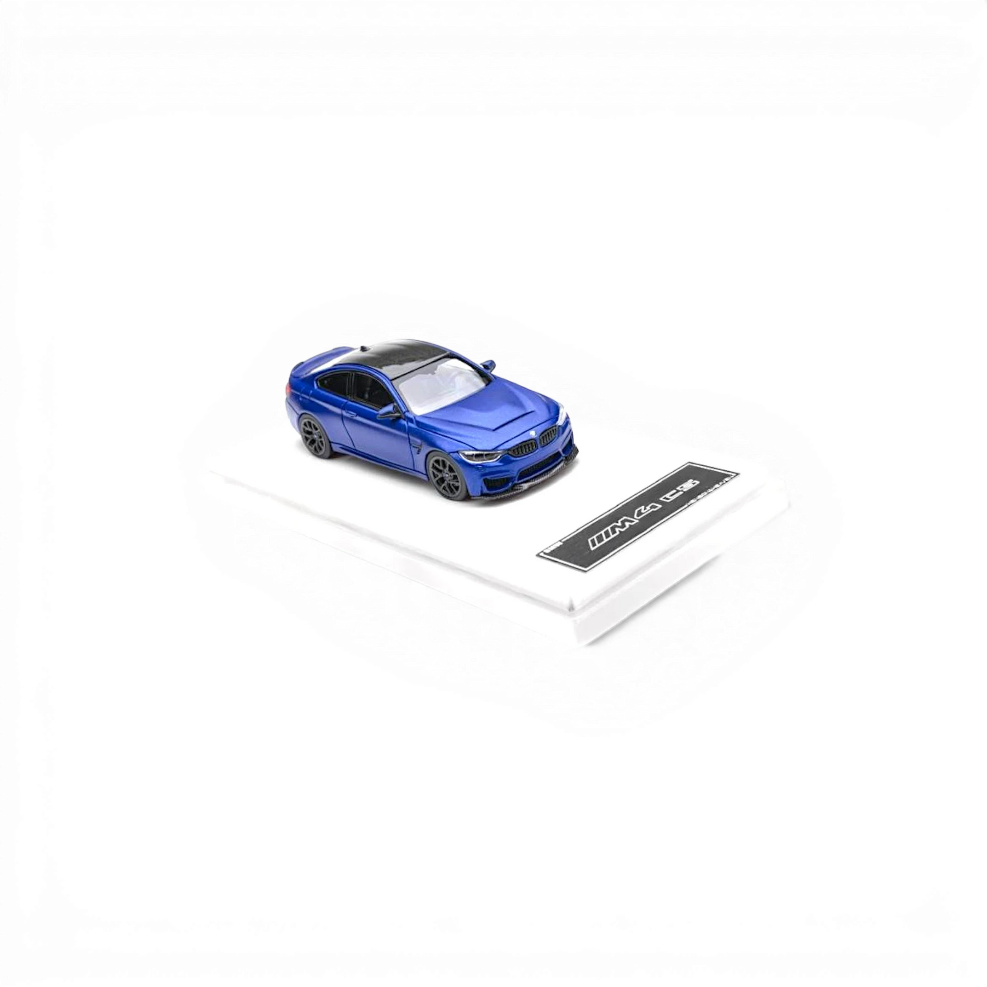 Lot57Supplies Diecast Shop 1:64 scale Frozen Dark Blue BMW F82 M4 CS diecast model car with black roof and wheels.