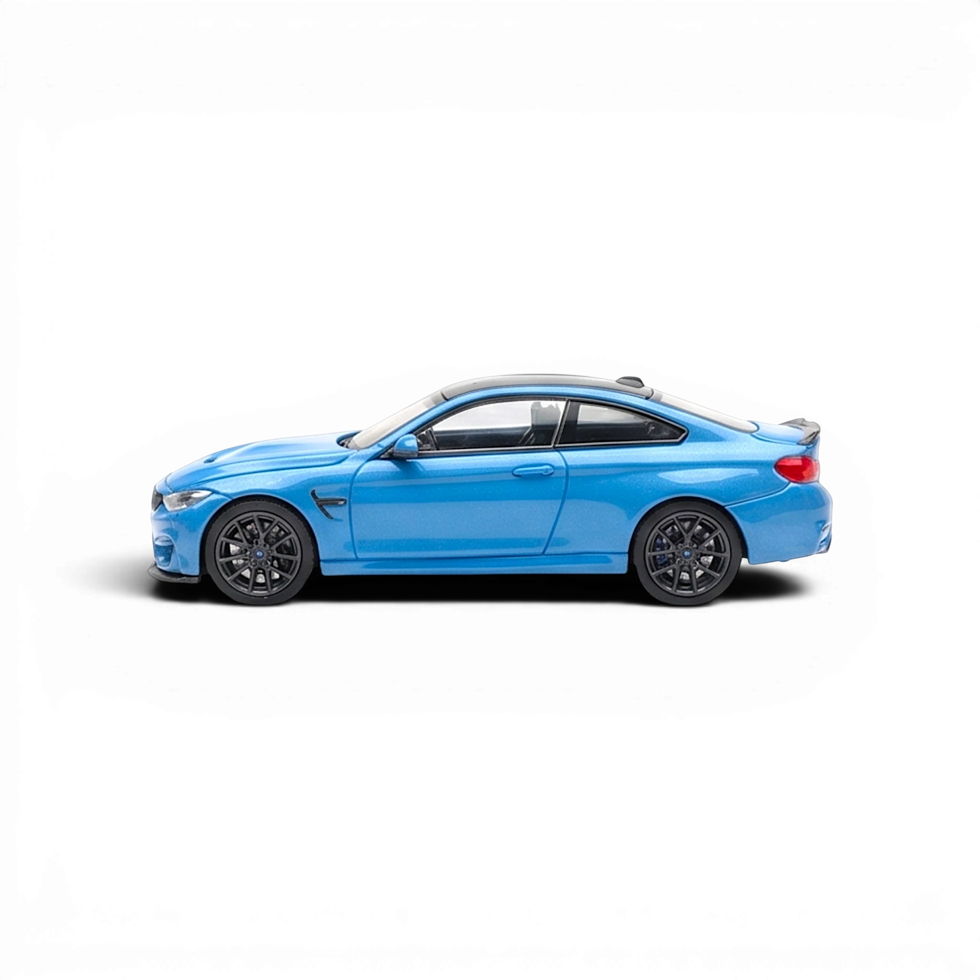 HH Model BMW F82 M4 CS diecast car in Yas Marina Blue from Lot57Supplies Diecast Shop, 1:64 scale side view.