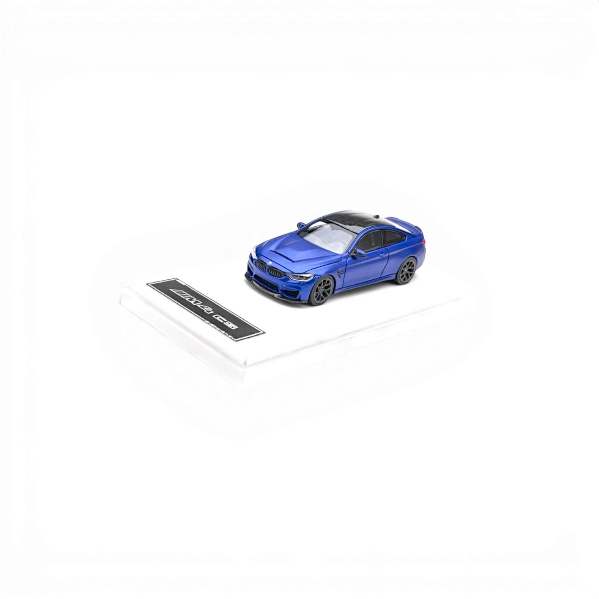 Lot57Supplies Diecast Shop 1:64 scale Frozen Dark Blue BMW F82 M4 CS model car with black roof and wheels.