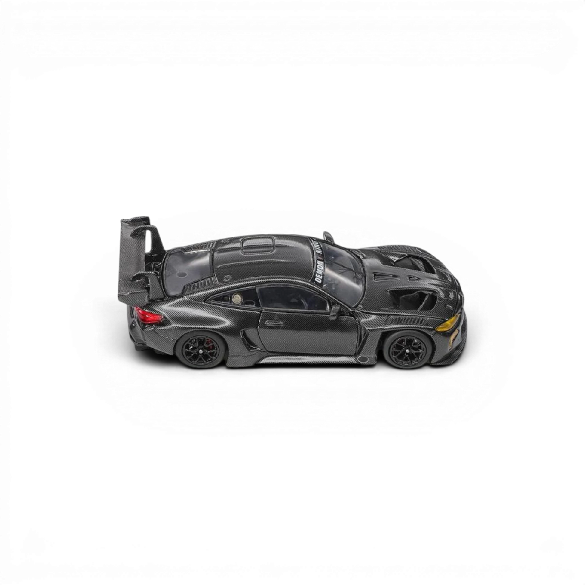 Lot57Supplies Diecast Shop 1:64 scale Demon King Auto BMW M4 GT3 diecast model car in black carbon fiber livery.