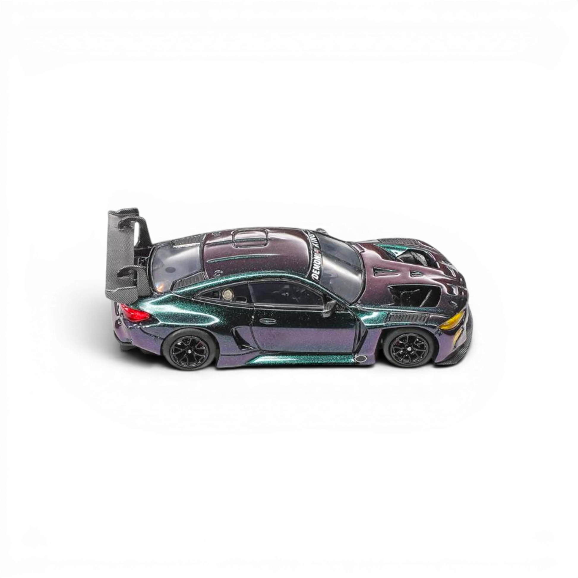 Lot57Supplies Diecast Shop 1:64 scale Demon King Auto BMW M4 GT3 diecast model car with a chameleon color-shift finish.