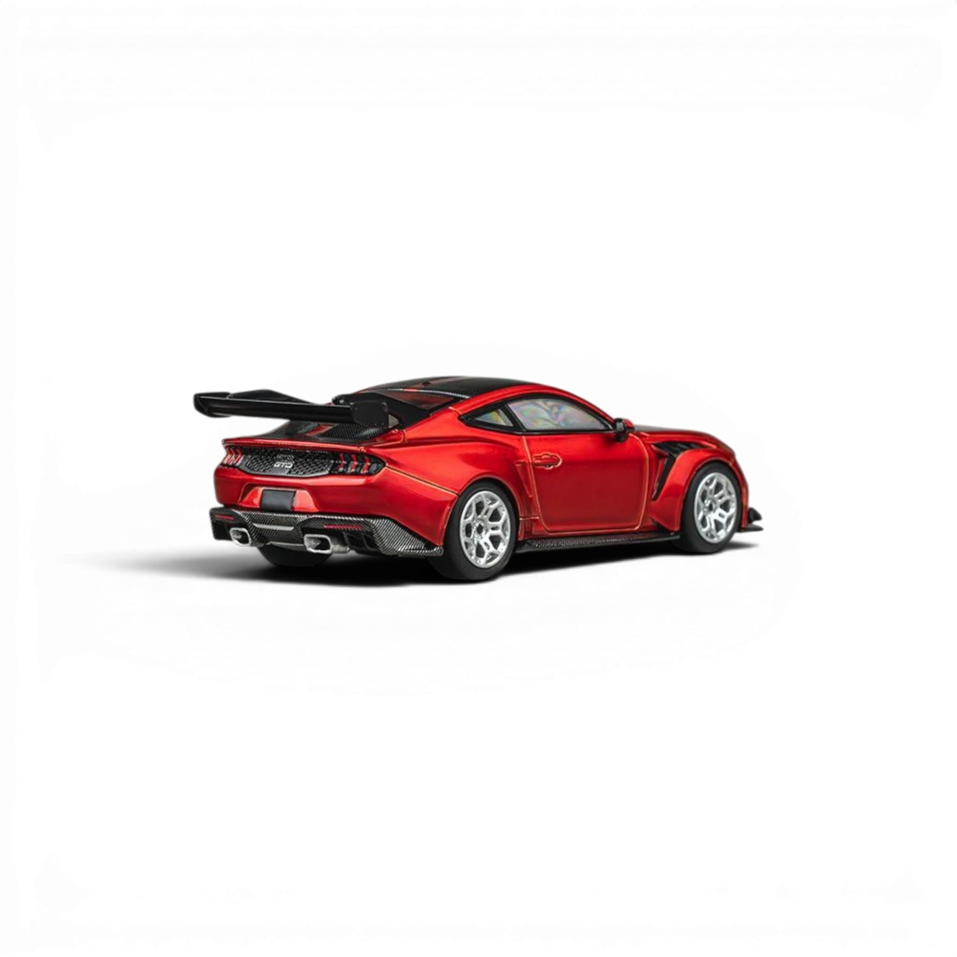 Lot57Supplies Diecast Shop CM Model Ford Mustang GTD 1:64 scale diecast model in Flame Red with a large rear spoiler and carbon fiber accents.