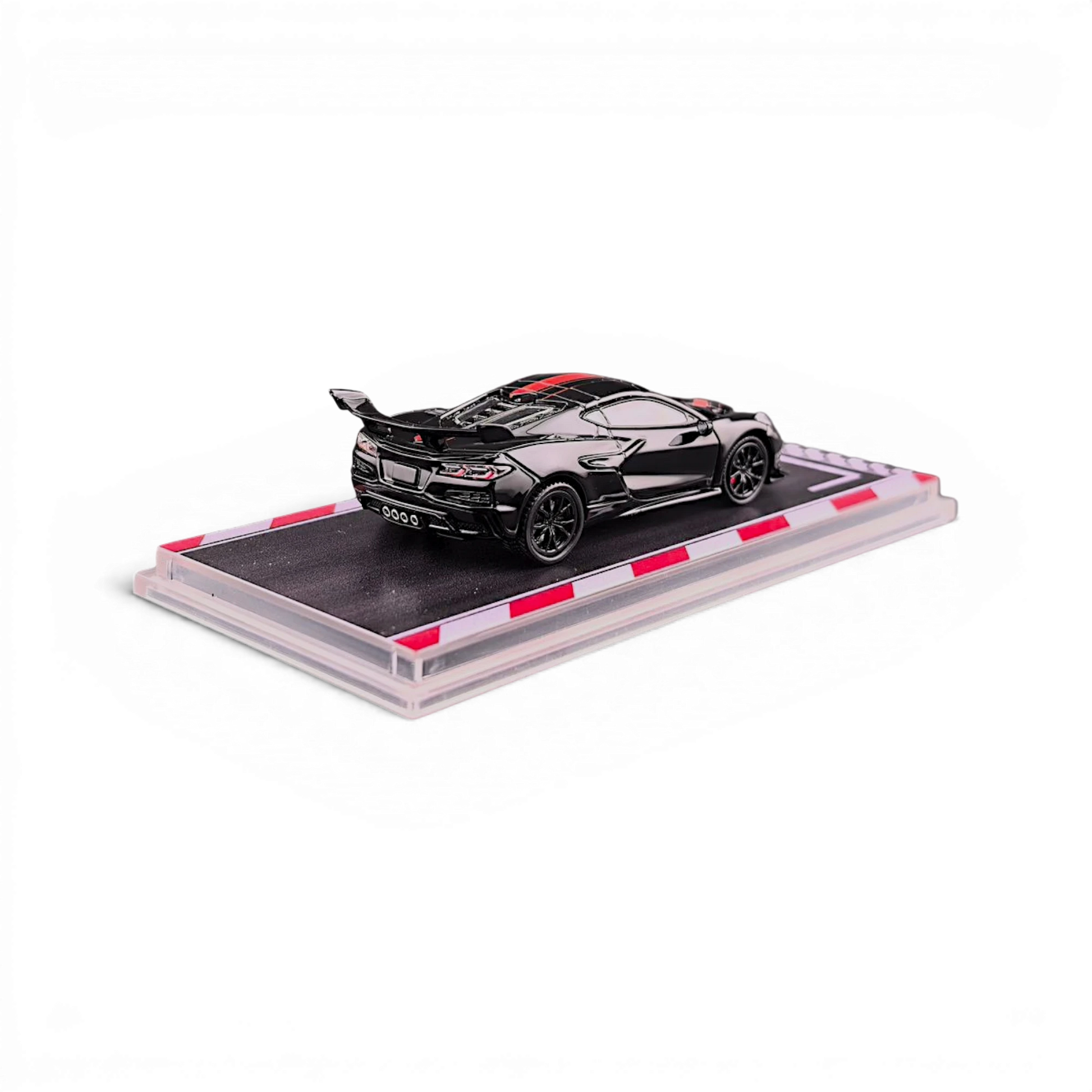Lot57Supplies Diecast Shop 1:64 scale black Corvette C8 ZR1 diecast model with red racing stripes and a clear display base.