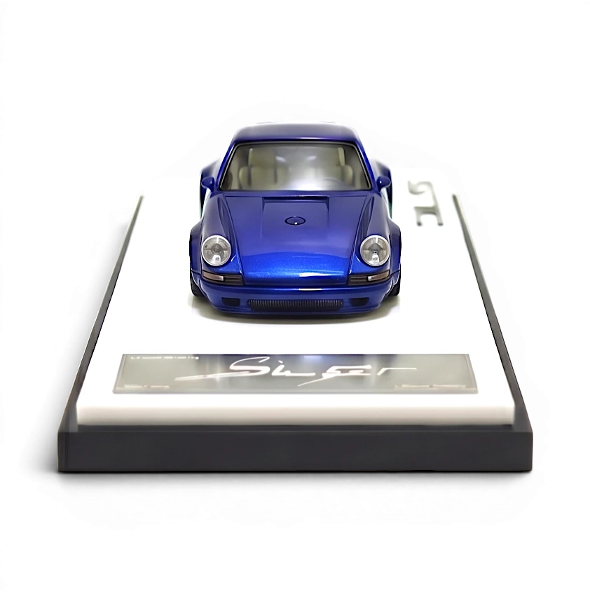 Lot57Supplies Diecast Shop blue metallic 1:64 scale DeepMaker Singer DLS resin model car on display base.