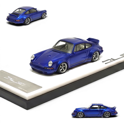 DeepMaker Singer DLS 1:64 scale blue metallic resin model car on display base.