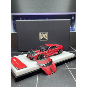 Lot57Supplies Diecast Shop DMY Ferrari 812C matte red 1:64 scale model car with opening hood on display stand