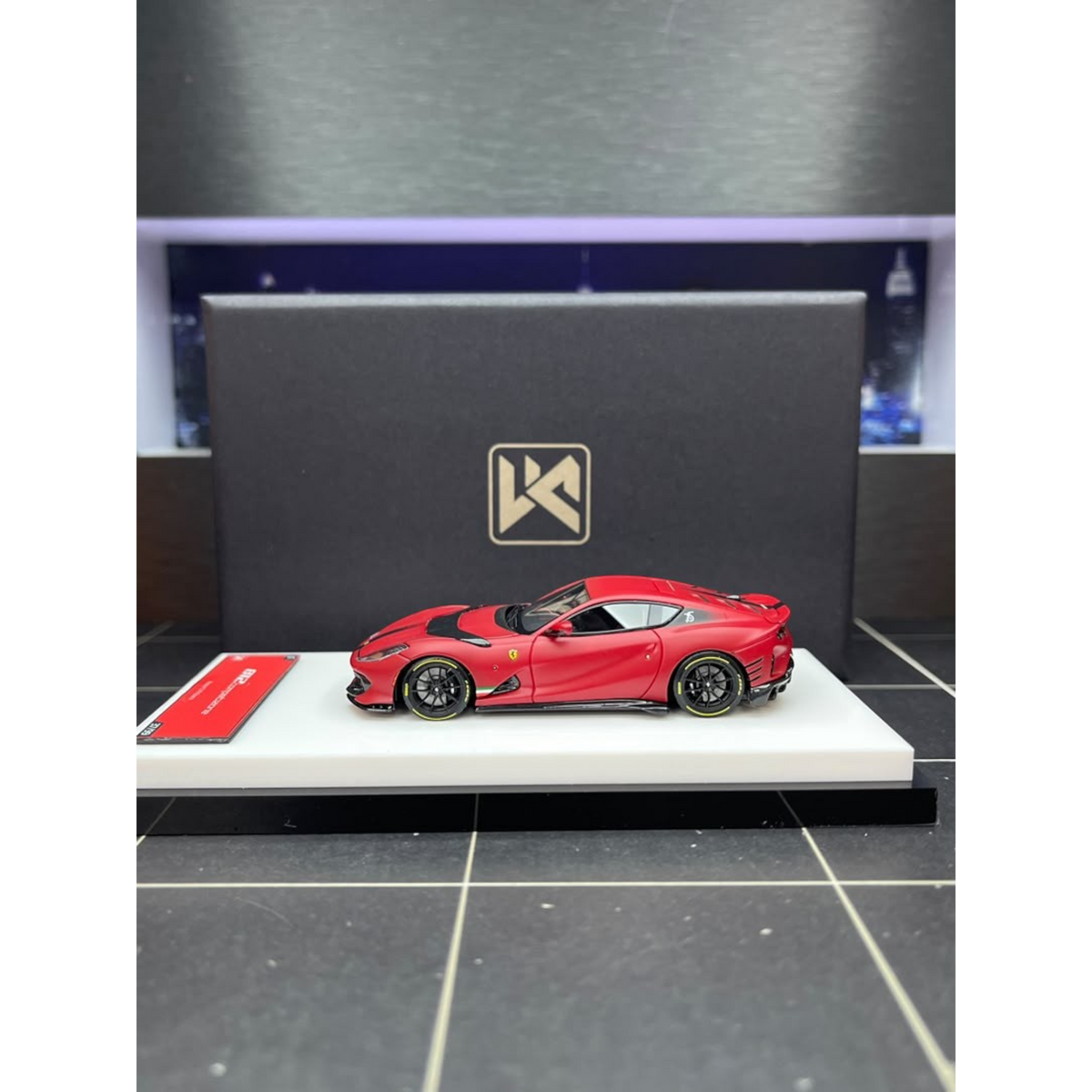 Lot57Supplies Diecast Shop DMY Ferrari 812C model car in matte red with opening hood, 1:64 scale resin collectible.