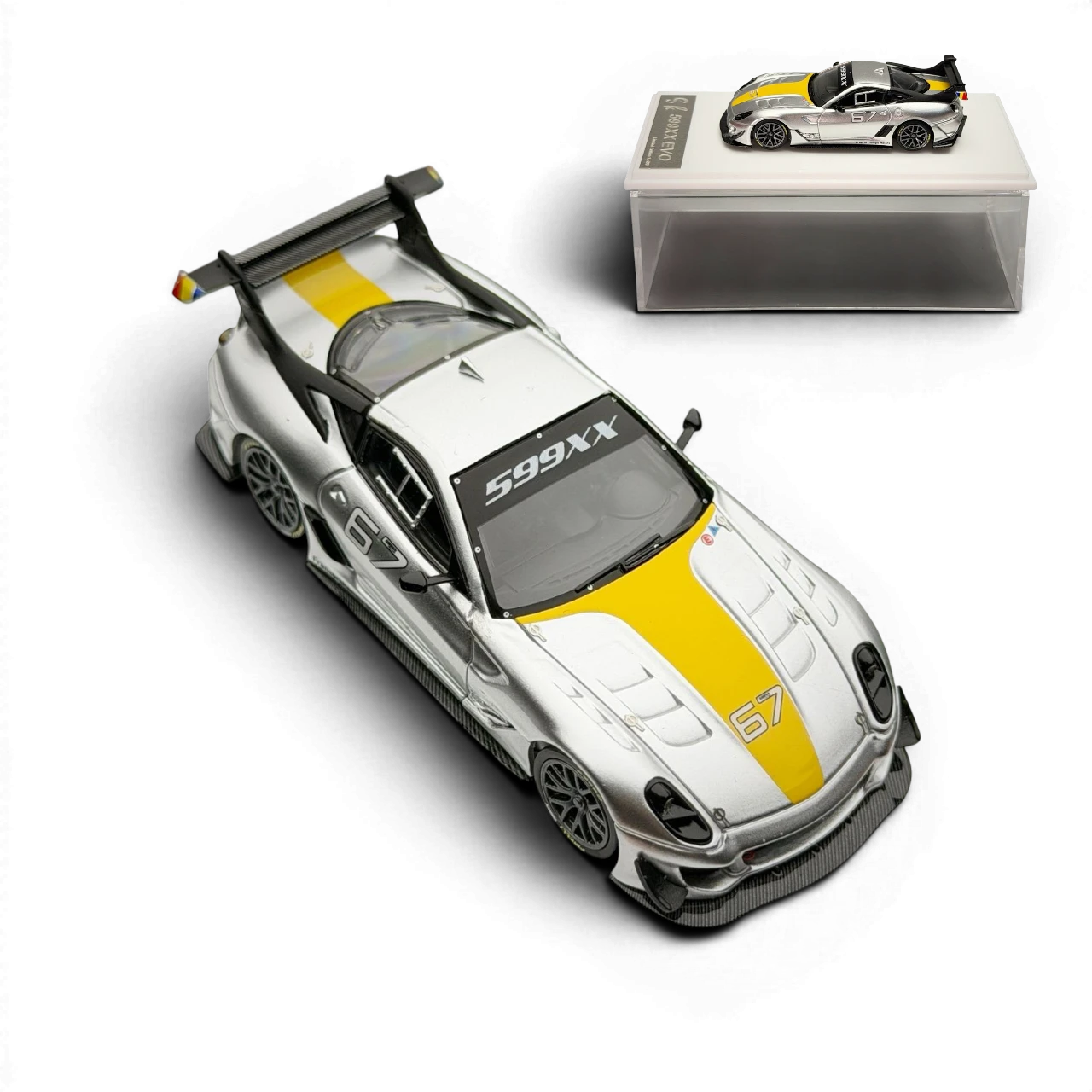 Lot57Supplies Diecast Shop metallic silver Ferrari 599XX EVO 1:64 scale model with yellow racing stripe and #67 details.