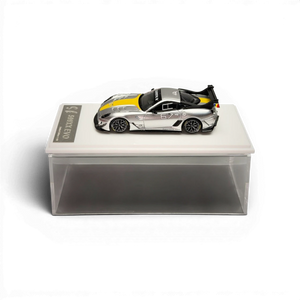 Lot57Supplies Diecast Shop metallic silver Ferrari 599XX EVO 1:64 scale model with yellow racing stripes and #67 detail.