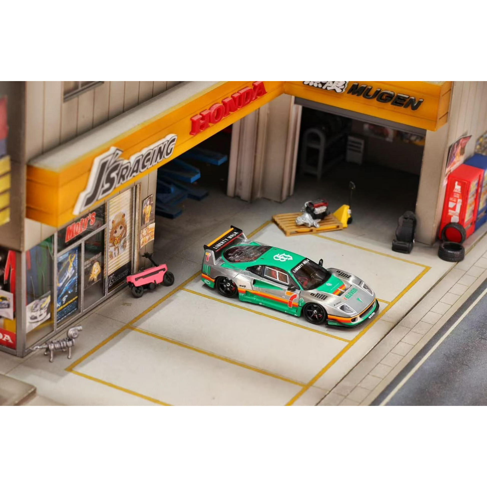 Lot57Supplies Diecast Shop GHOST PLAYER Ferrari F40 diecast model in 7-Eleven livery parked in a miniature garage diorama