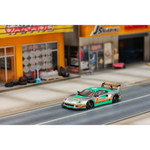 Lot57Supplies Diecast Shop 1:64 scale GHOST PLAYER Ferrari F40 diecast model car with 7-Eleven livery on a diorama road