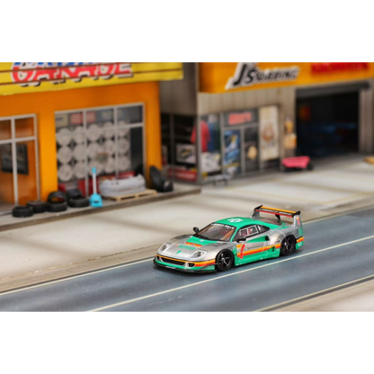 Lot57Supplies Diecast Shop 1:64 scale GHOST PLAYER Ferrari F40 diecast model car with 7-Eleven livery on a diorama road