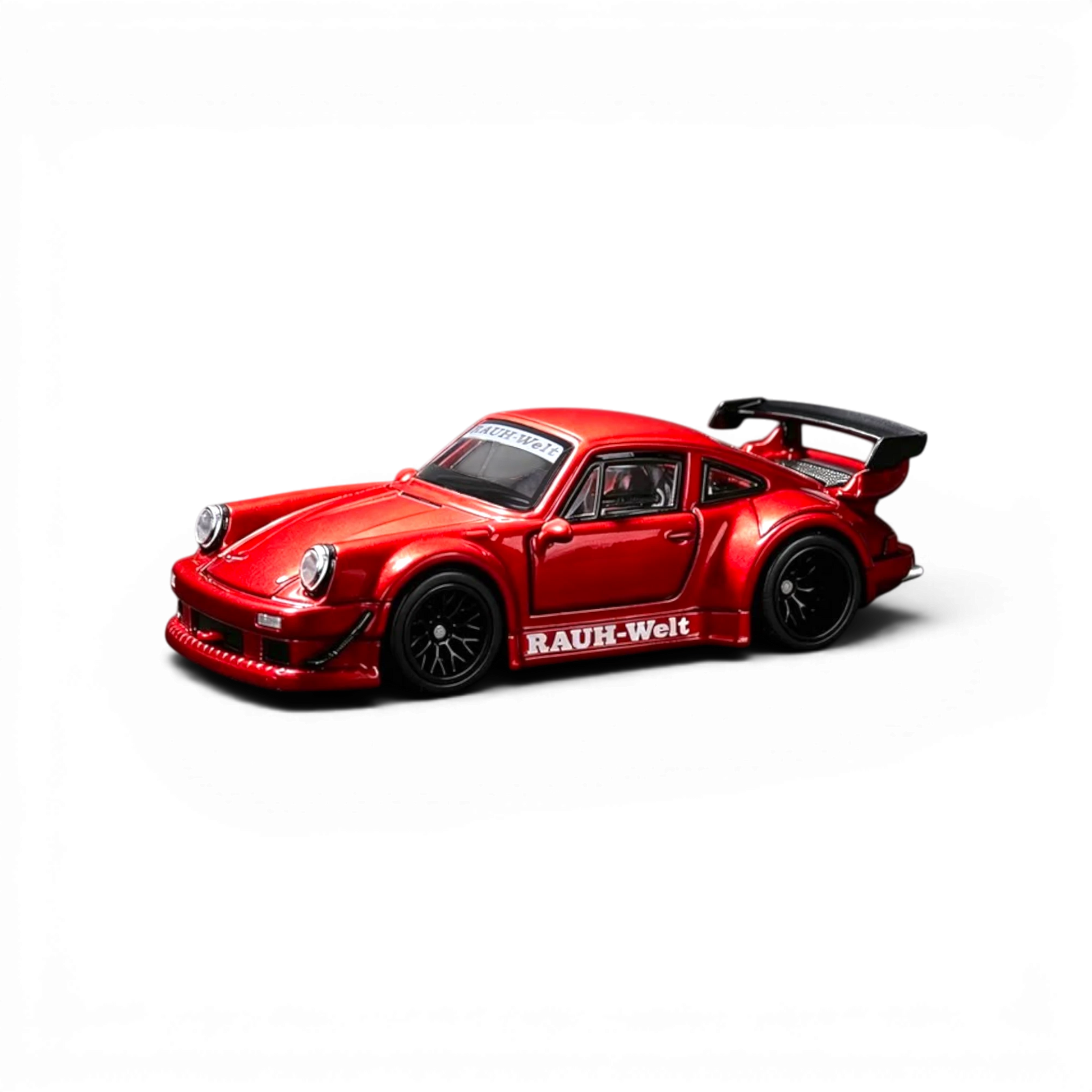 Lot57Supplies Diecast Shop FG RWB 930 diecast model car in transparent red, 1:64 scale with openable features.