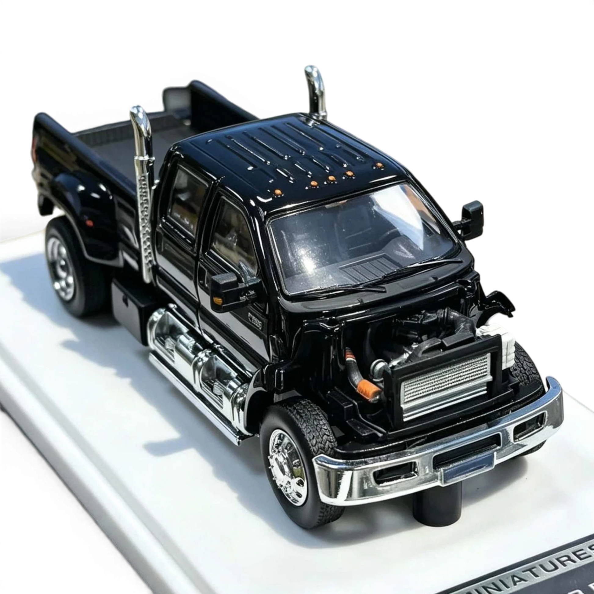Lot57Supplies Diecast Shop MK Miniatures 1:64 scale Ford F650 Super Duty diecast truck in agate black with open hood