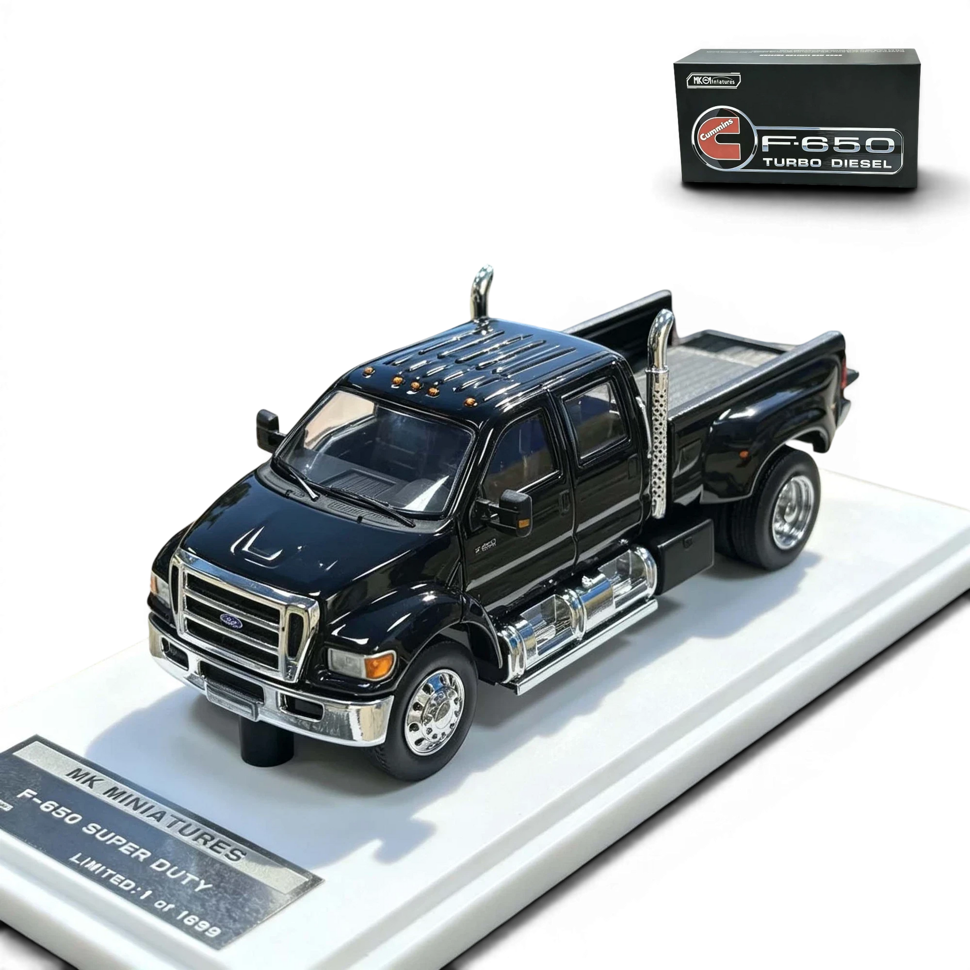 Lot57Supplies Diecast Shop MK Miniatures 1:64 scale Ford F650 Super Duty diecast truck in Agate Black with open tailgate