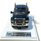 Lot57Supplies Diecast Shop MK Miniatures 1:64 scale Ford F650 Super Duty diecast truck in agate black on display stand