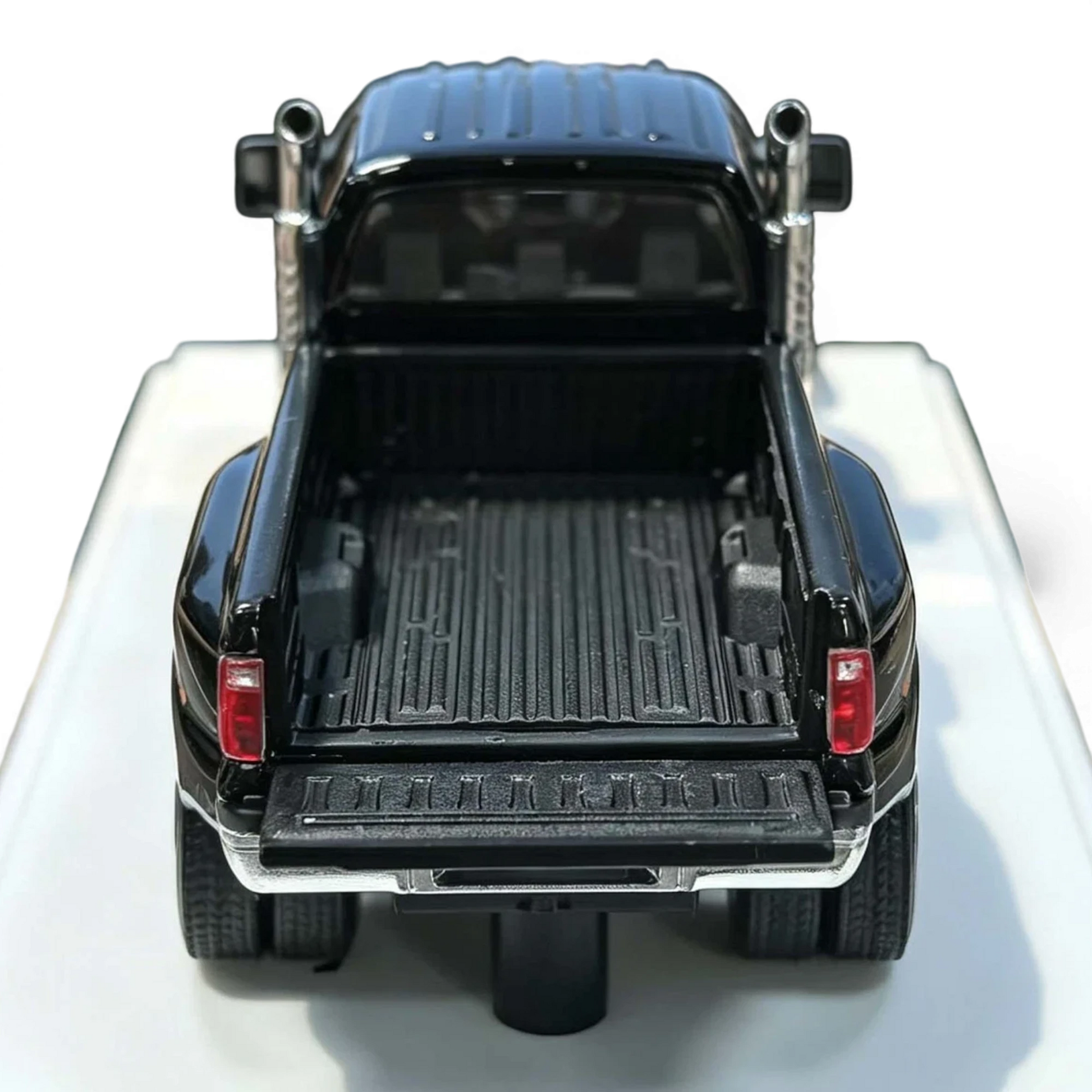 Lot57Supplies Diecast Shop MK Miniatures 1:64 scale diecast Ford F650 Super Duty in Agate Black with open tailgate