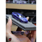 Lot57Supplies Diecast Shop 1:64 scale matte blue resin Gemballa Mirage GT model car on a grey foam display base.
