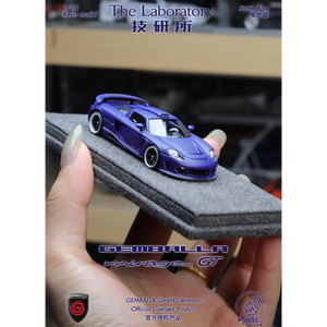 Lot57Supplies Diecast Shop 1:64 scale matte blue resin Gemballa Mirage GT model car on a grey foam display base.