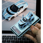 Lot57Supplies Diecast Shop GLAMCRAFT 1:64 scale light blue Ferrari 812 Competizione diecast model with opening parts