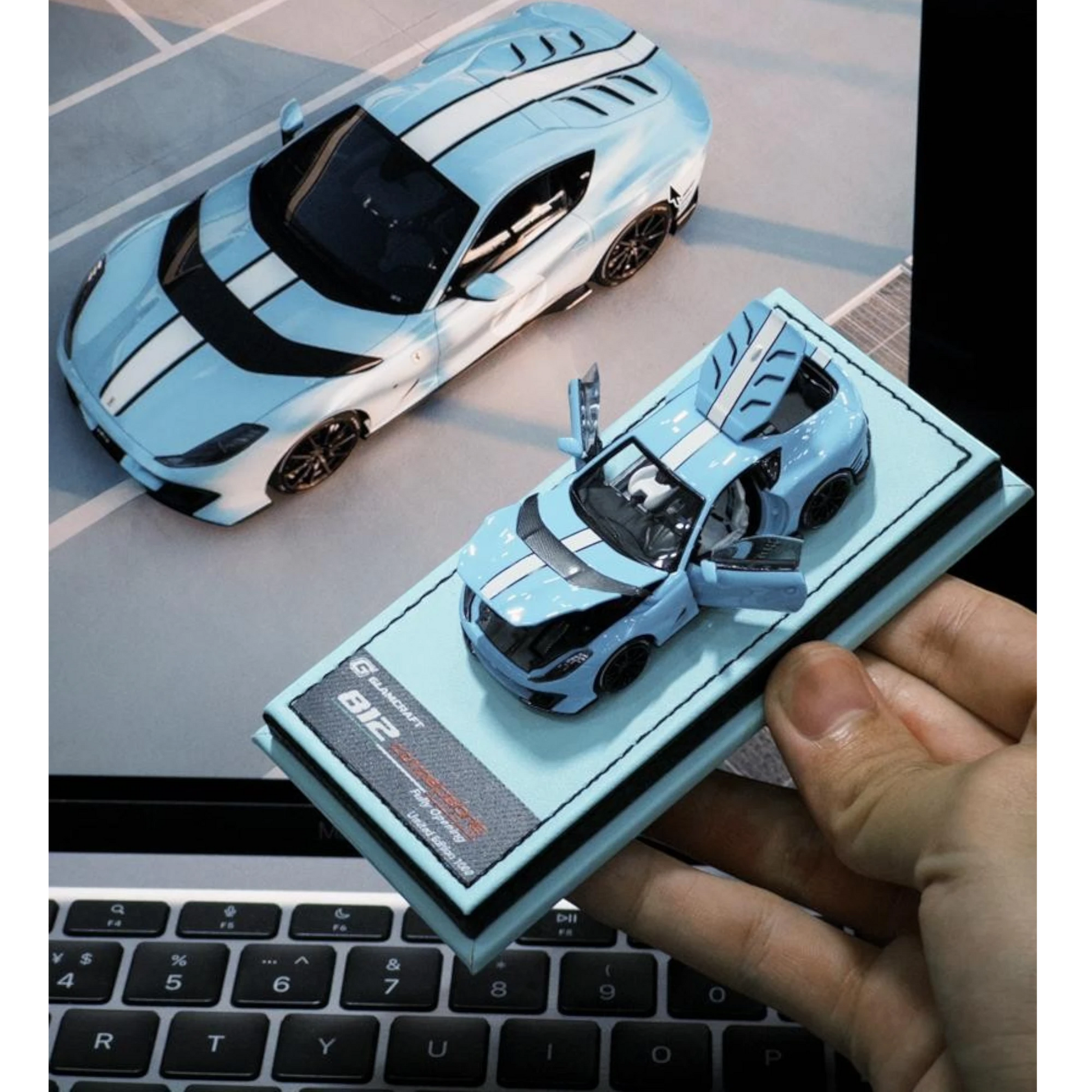 Lot57Supplies Diecast Shop GLAMCRAFT 1:64 scale light blue Ferrari 812 Competizione diecast model with opening parts