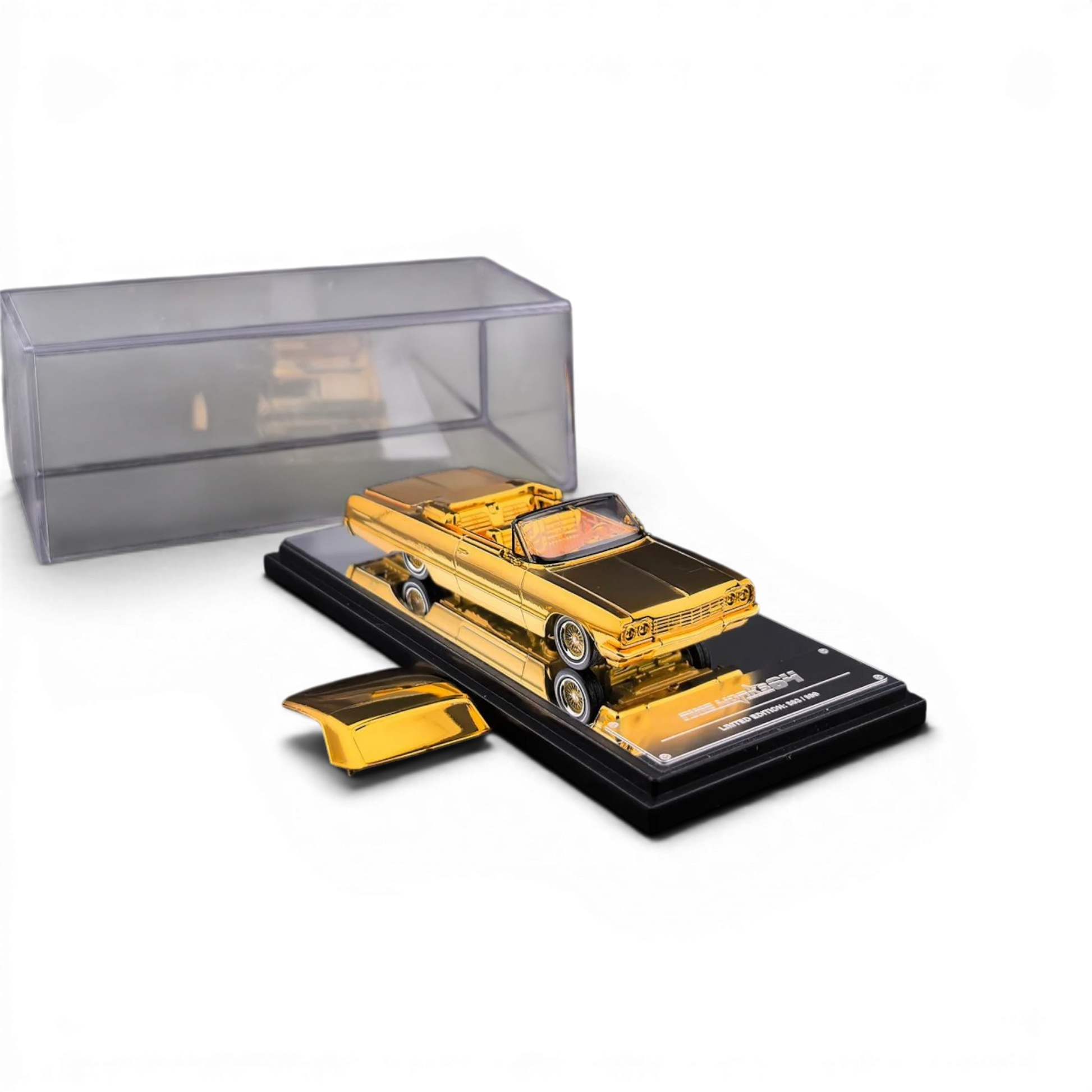 Lot57Supplies Diecast Shop 1:64 scale chrome gold 1964 Chevrolet Impala lowrider diecast model with display case