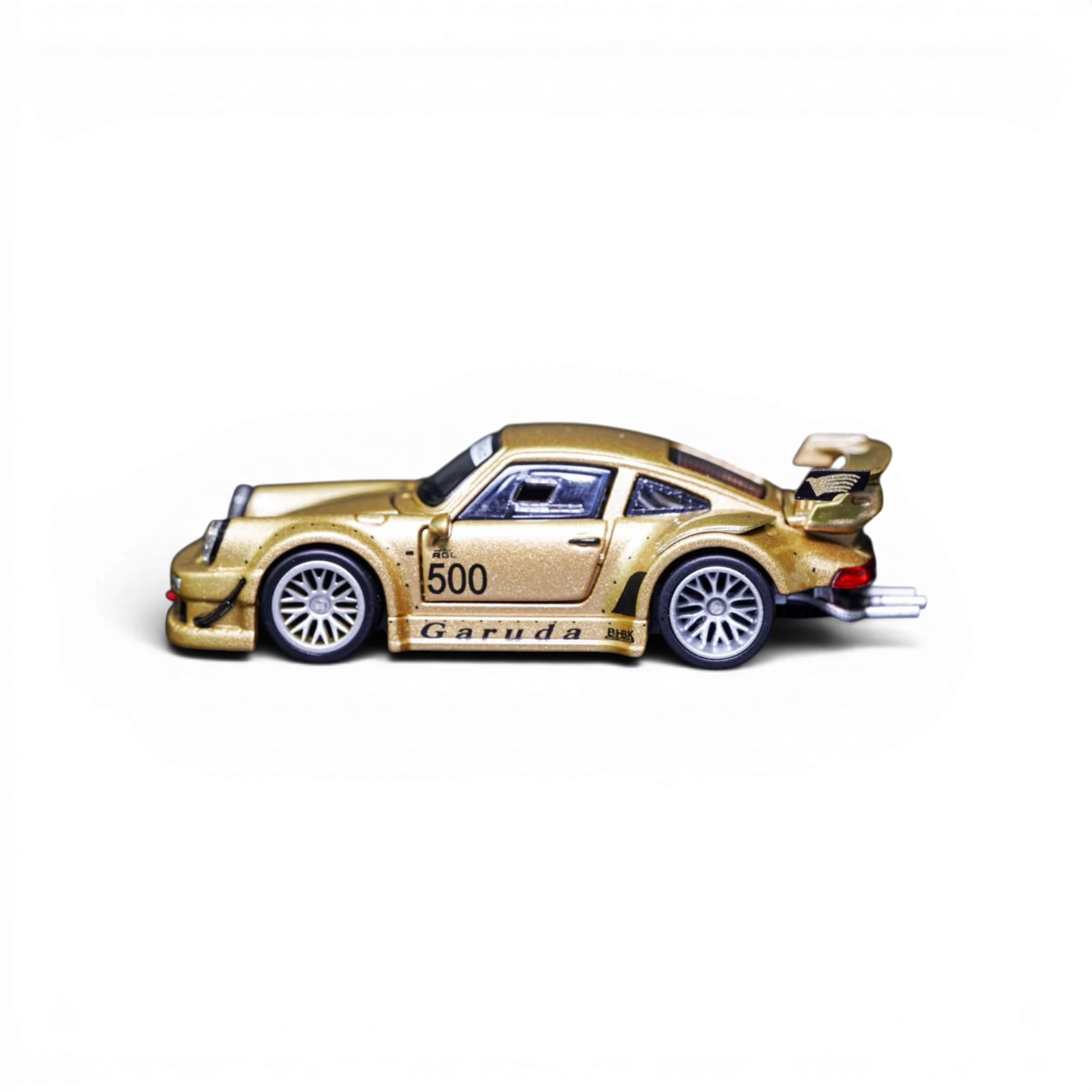 Lot57Supplies Diecast Shop TPC Customized Version RWB930 gold diecast model car in 1:64 scale with side view