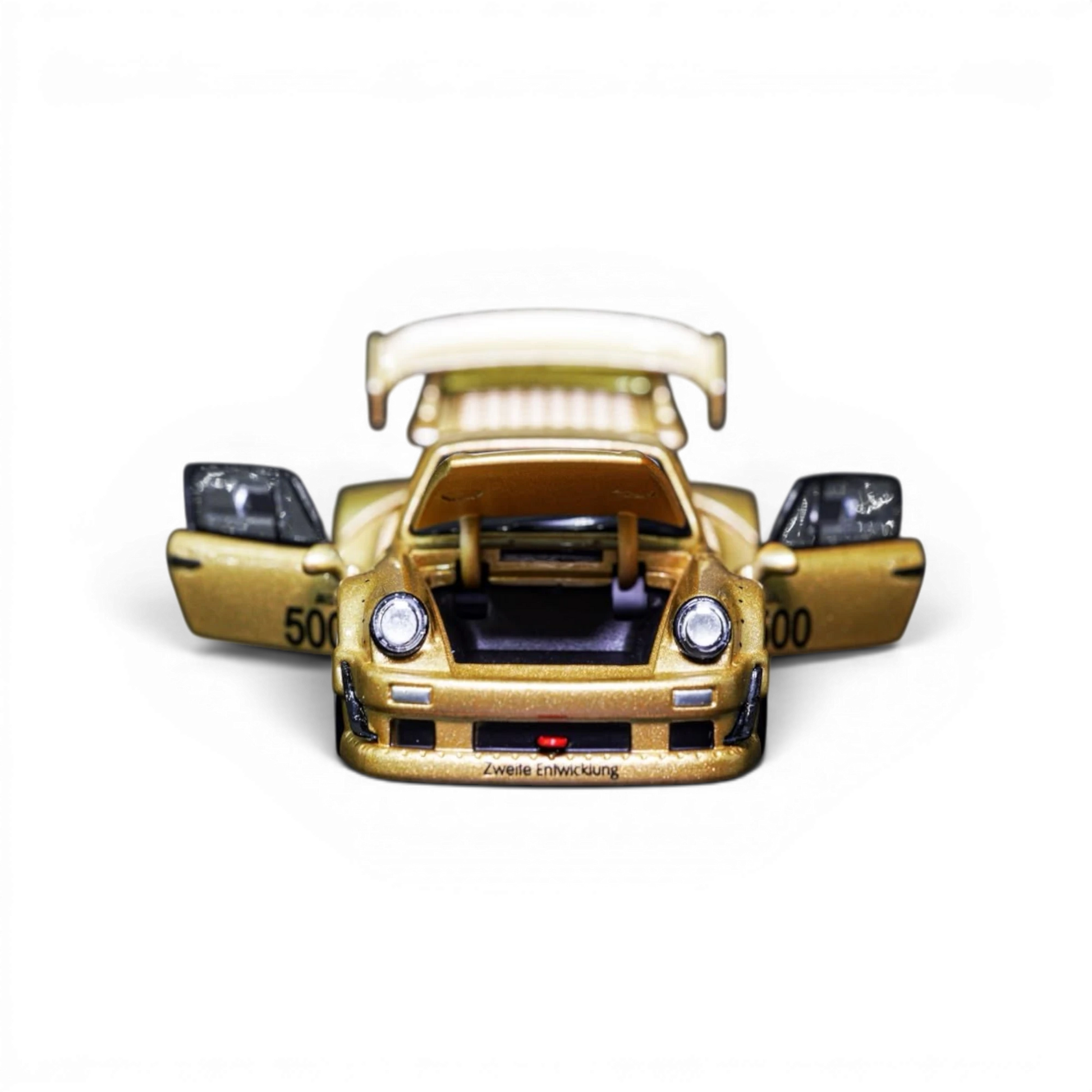 Lot57Supplies Diecast Shop TPC Customized RWB930 gold diecast model car with open doors and hood on black background