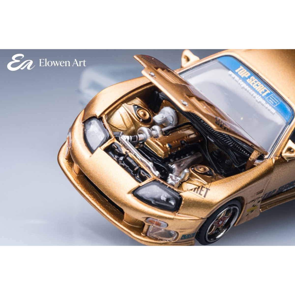 Lot57Supplies Diecast Shop Elowen Art gold topSecret A80 Supra MK4 1:64 scale model with open hood and engine detail