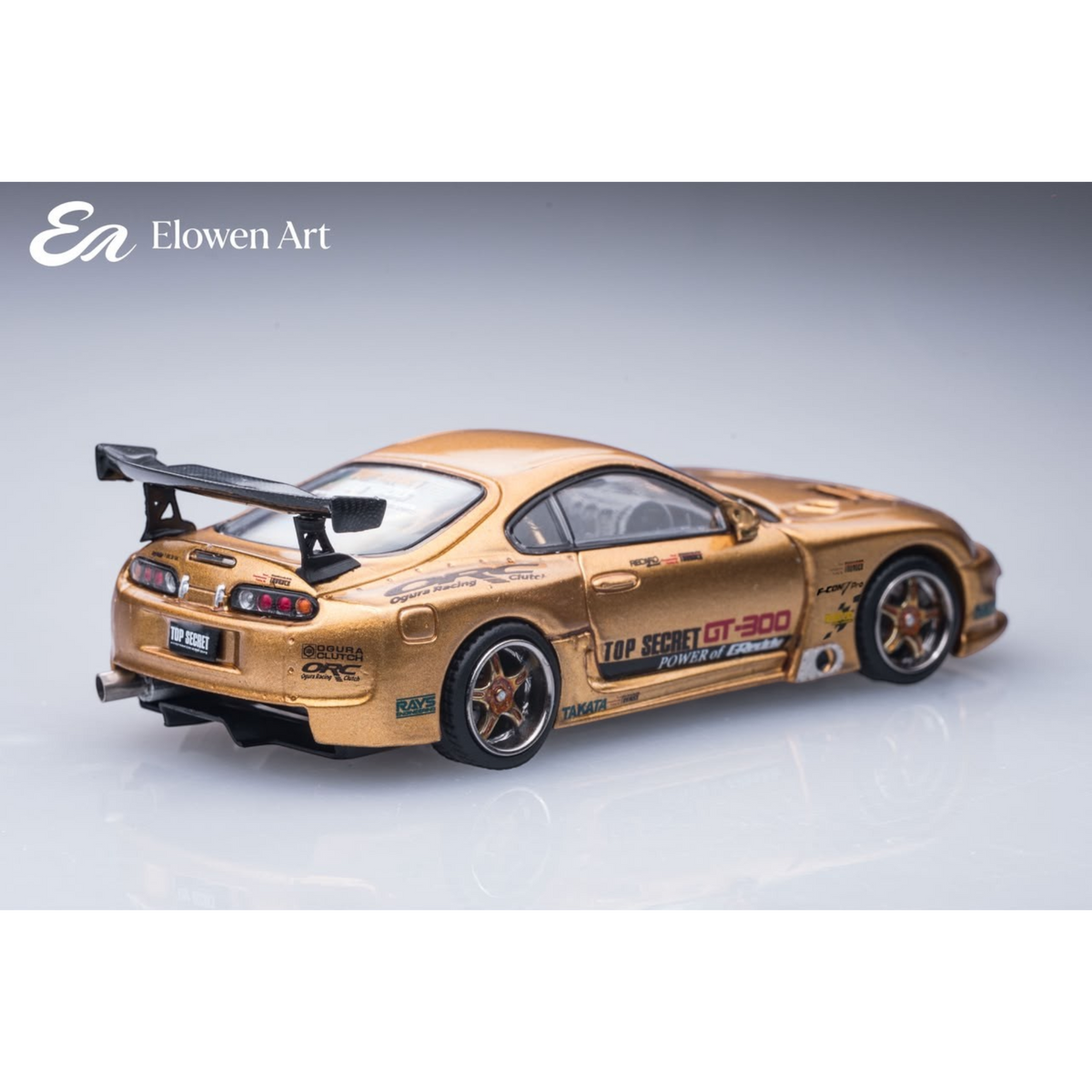 Lot57Supplies Diecast Shop Elowen Art gold topSecret A80 Supra MK4 1:64 scale diecast model car rear view