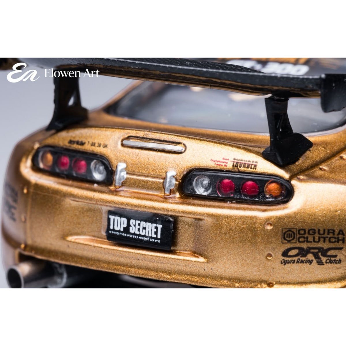 Lot57Supplies Diecast Shop Elowen Art 1:64 scale gold topSecret A80 Supra MK4 diecast model rear view