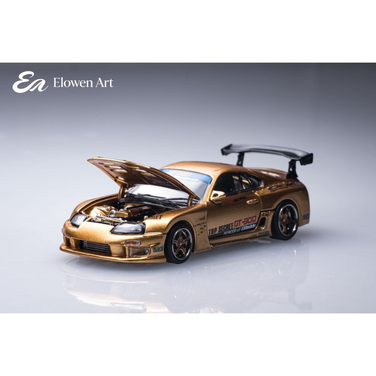 Lot57Supplies Diecast Shop Elowen Art 1:64 scale gold topSecret A80 Supra MK4 diecast model car with open hood